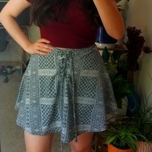 Geometric pattern fit and flare skirt.